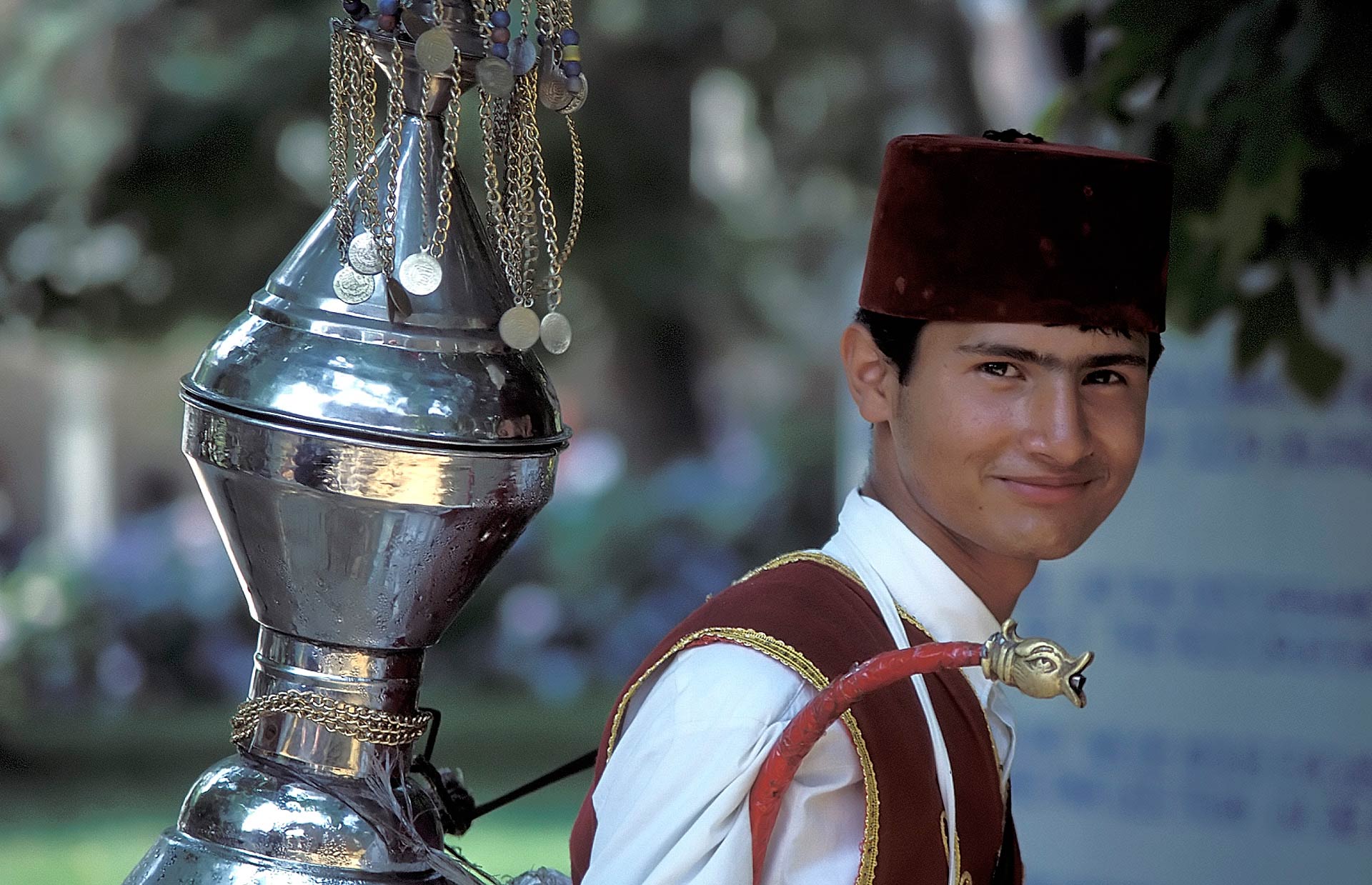 Resplendently attired juice vendor, Türkiye (Turkey)